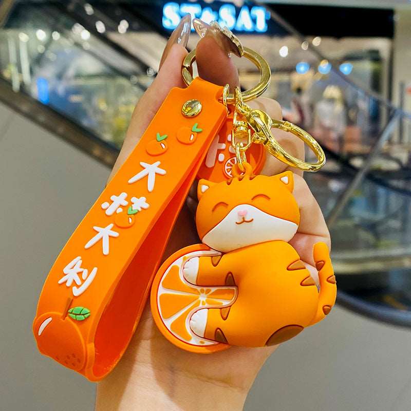 Kawaii Japanese Cat With An Orange Keychain Wakaii
