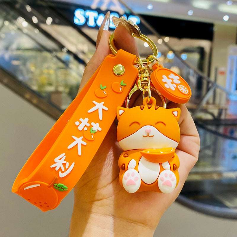 Kawaii Japanese Cat With An Orange Keychain Wakaii