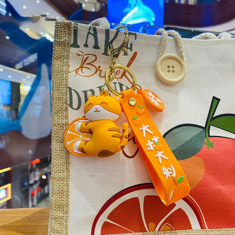 Kawaii Japanese Cat With An Orange Keychain Wakaii