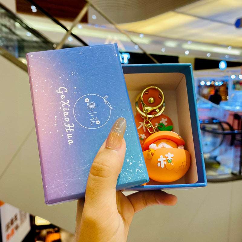 Kawaii Japanese Cat With An Orange Keychain Wakaii