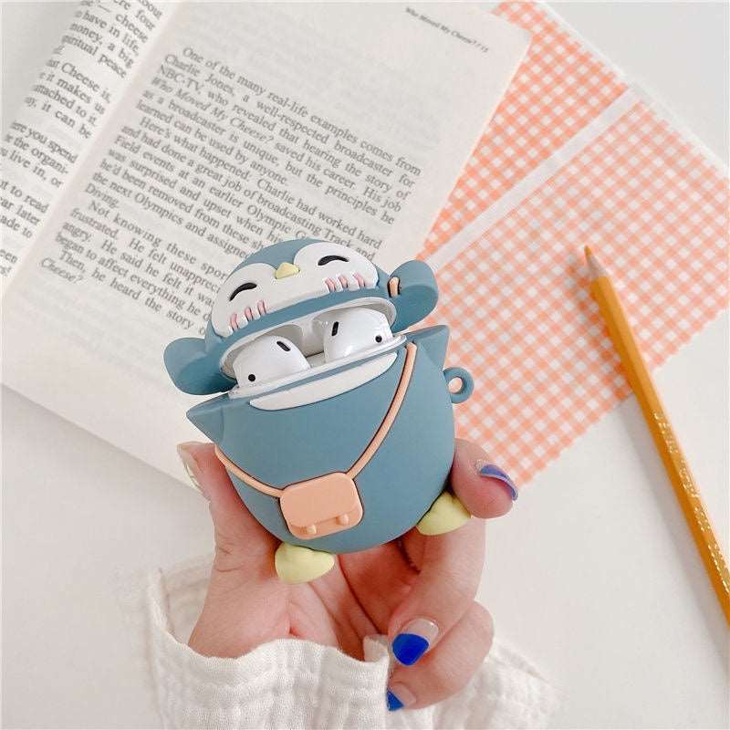 The Purse-Wearing Penguin Airpod Case Wakaii