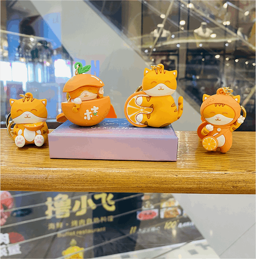 Kawaii Japanese Cat With An Orange Keychain Wakaii