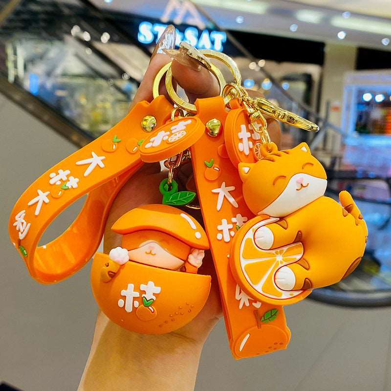 Kawaii Japanese Cat With An Orange Keychain Wakaii